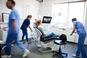 A blurred view of dentists in a dental clinic