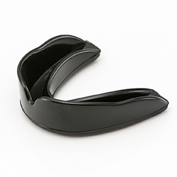 A black mouthguard for playing sports