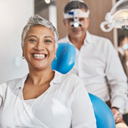 Closeup of woman smiling while sitting in dental chair