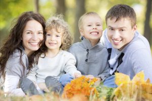 Happy family with beautiful smiles from the family dentist owings mills loves