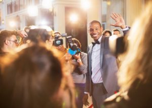 celebrity smiling for cameras 