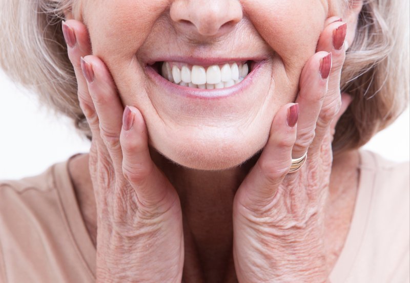 woman smiling with dentures